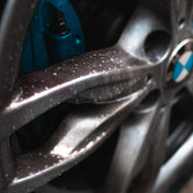close up of bmw m135i alloy wheel being cleaned and detailed