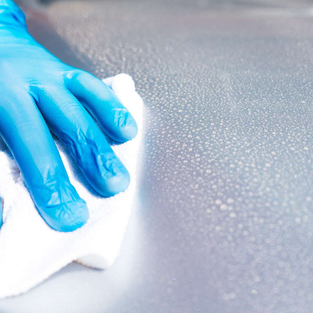 beading ceramic quick detailer being wiped away