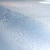 silver car with beading quick detailer on paintwork