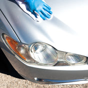 silver jaguar getting cleaned with ceramic quick detailer high gloss