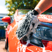 1000:1 ultra thick high foaming automotive ph neutral car shampoo anti marring car being detailed with plush lambswool microfibre wash mitt