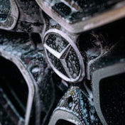 Close up of diamond cut mercedes amg wheels with wheel cleaner on them