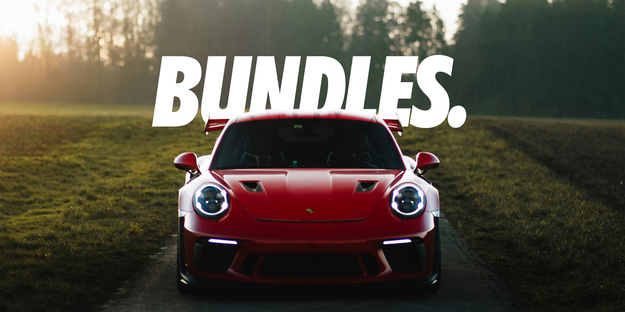 bundles orange Porsche gtr3rs front on shot with lights on