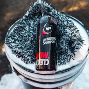 vp detailing ph neutral shampoo ontop of wash mitt in soapy bucket