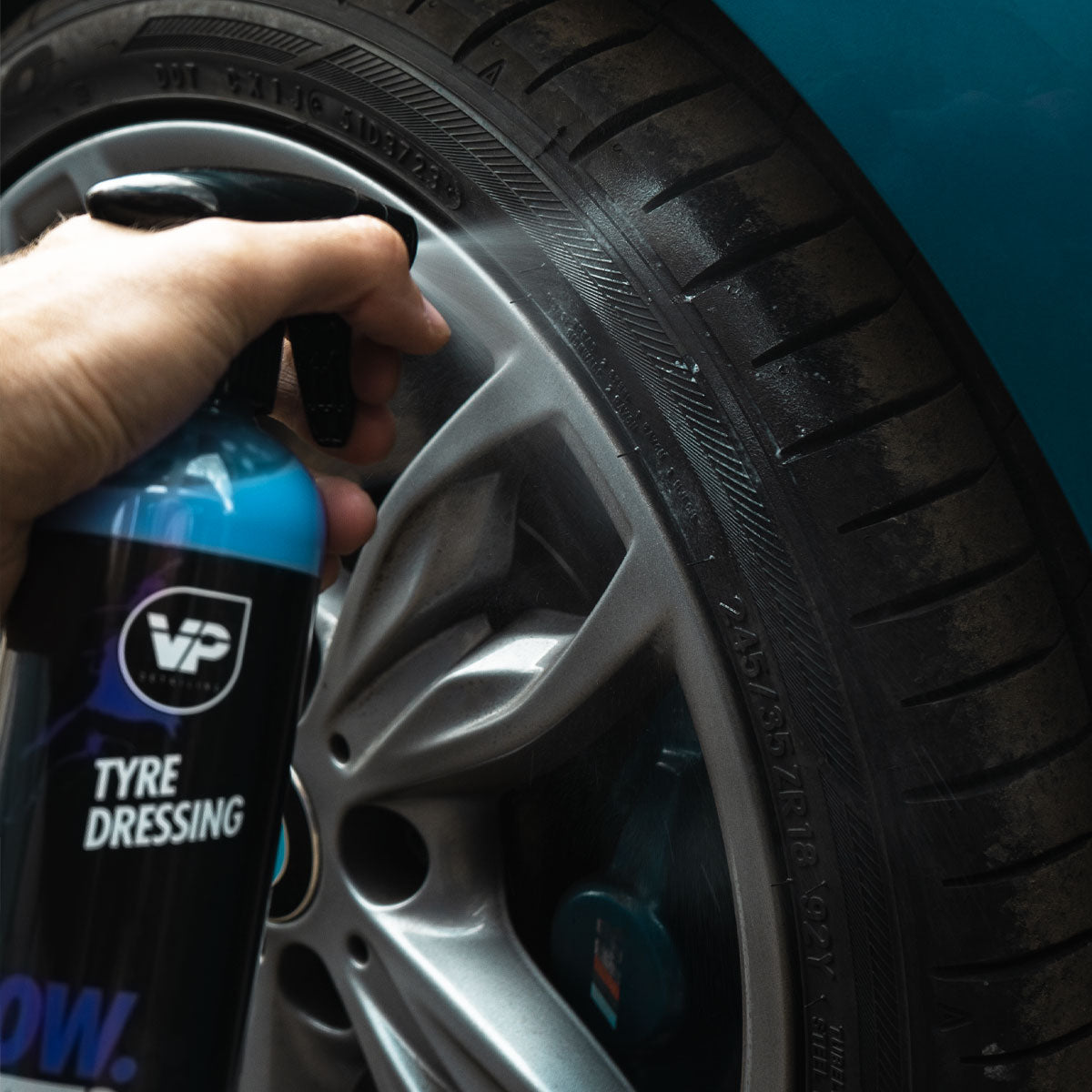 vp detailing tyre dressing being applied by spray onto 245/35R18 tire