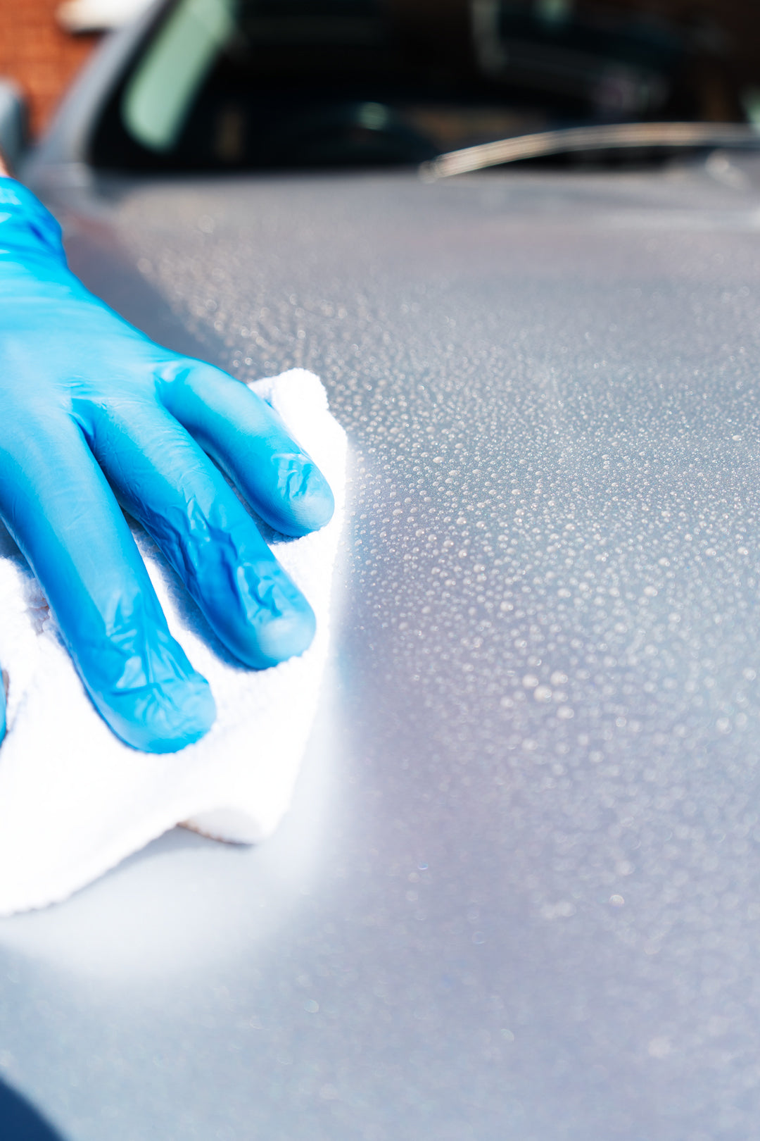 beading ceramic quick detailer being wiped away