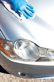 silver jaguar getting cleaned with ceramic quick detailer high gloss