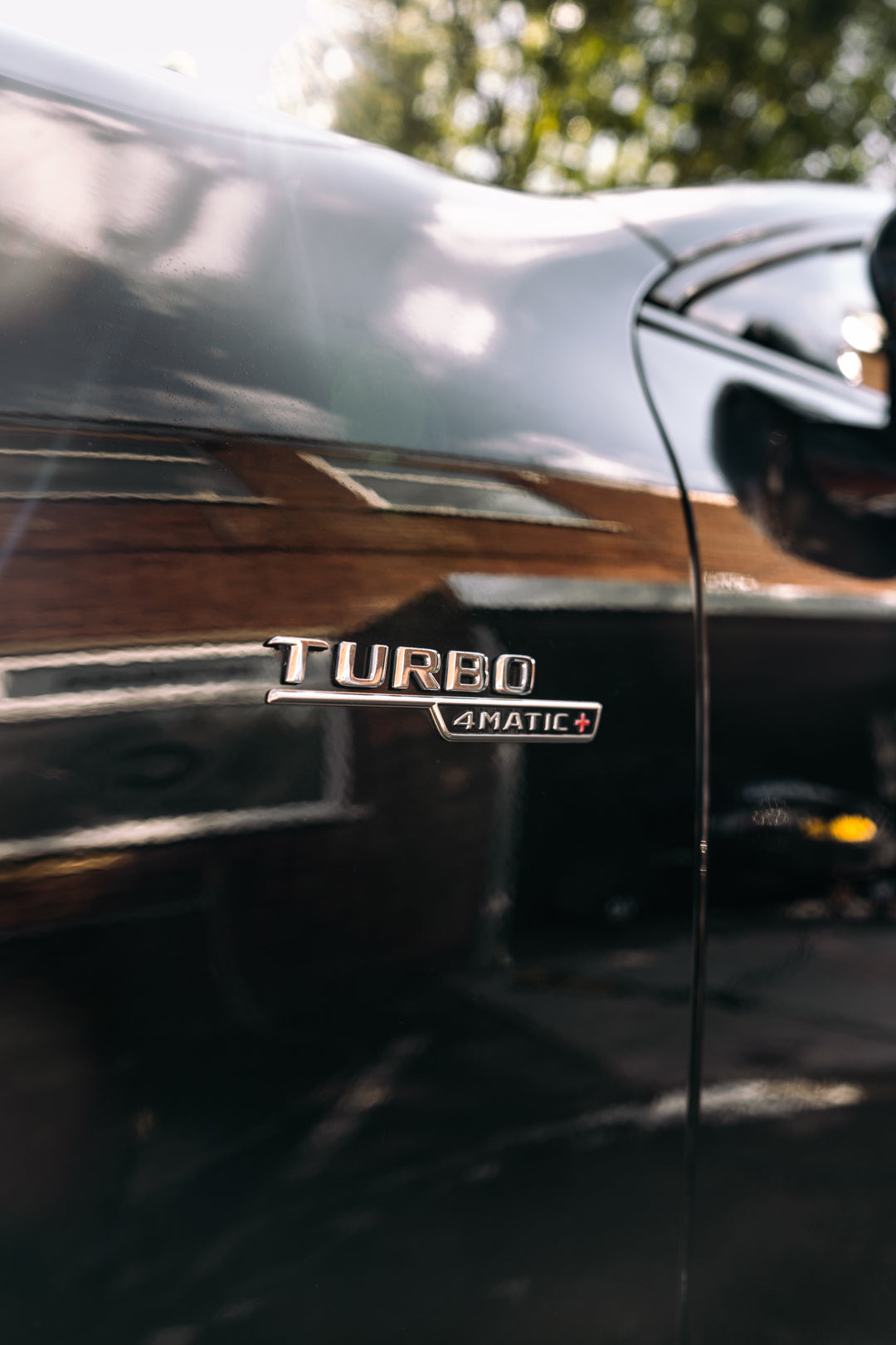 mercedes detailed up close of turbo 4matic+ badge