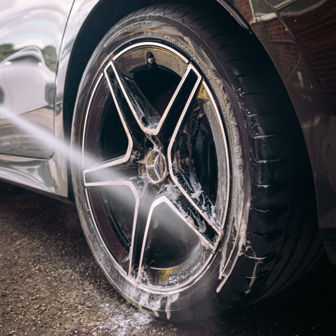mercedes alloy wheel being jet washed and detailed