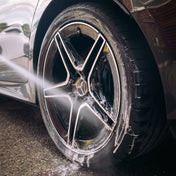 mercedes alloy wheel being jet washed and detailed