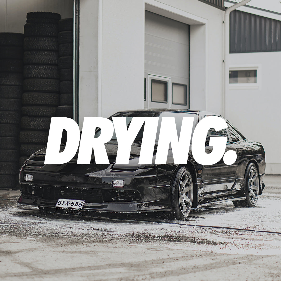 180sx nissian with te37 wheels drying off clean car
