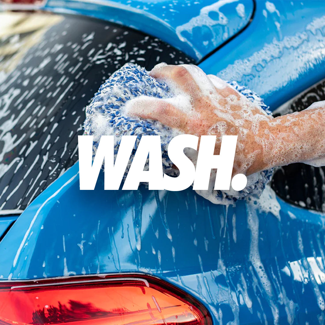 ford focus blue getting washed and detailed detailing wash mitt